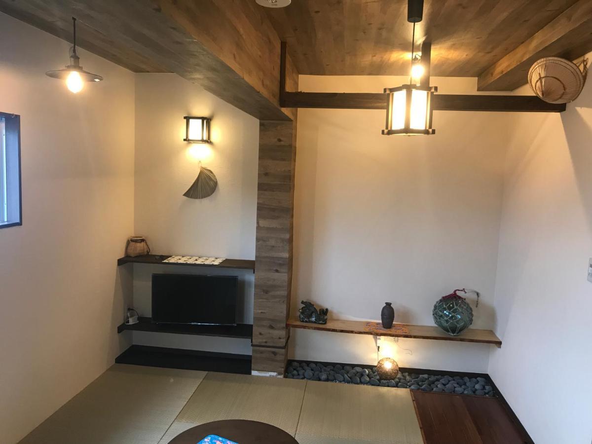 Urban Condominium Wafutei Naha Pokoj fotografie