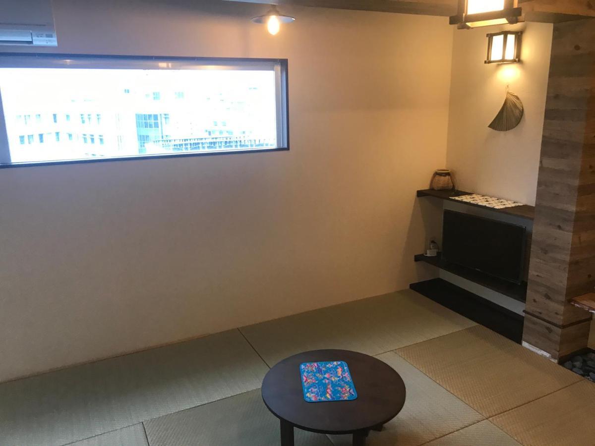 Urban Condominium Wafutei Naha Pokoj fotografie