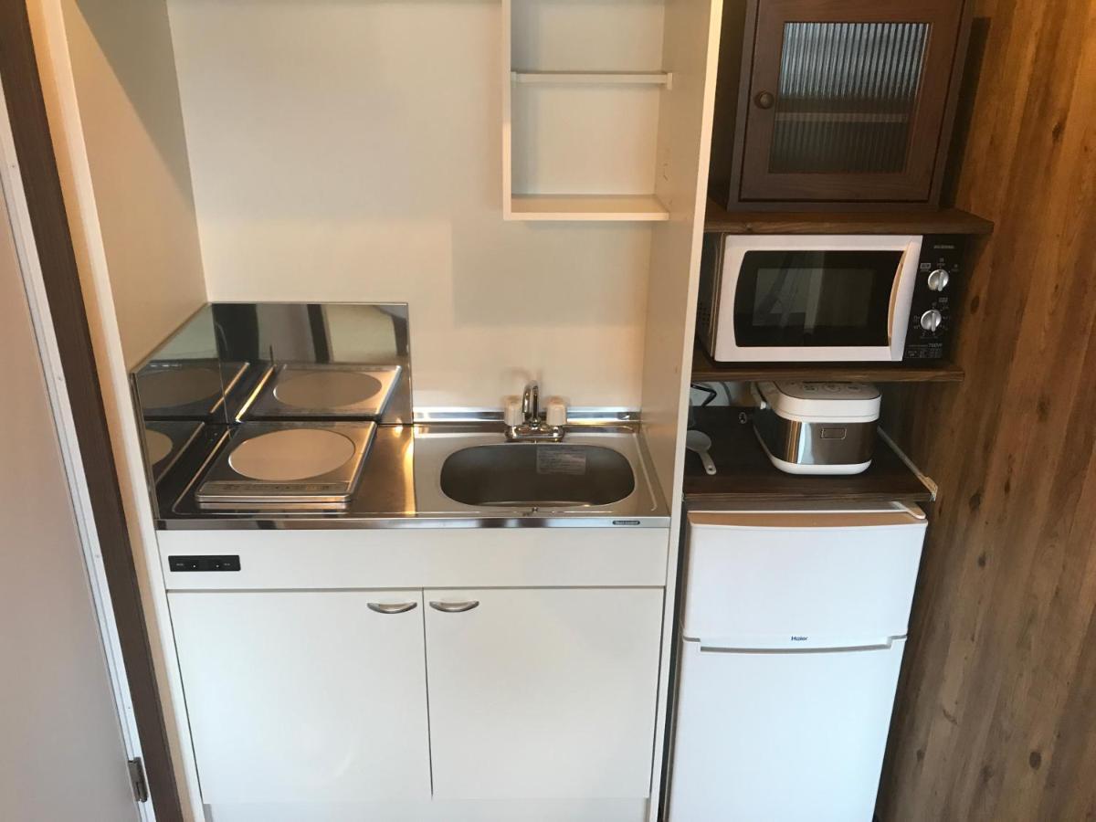 Urban Condominium Wafutei Naha Pokoj fotografie